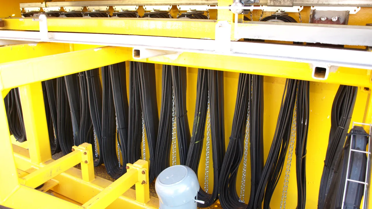 Process Crane with electromagnet at a loading facility in a steel mill