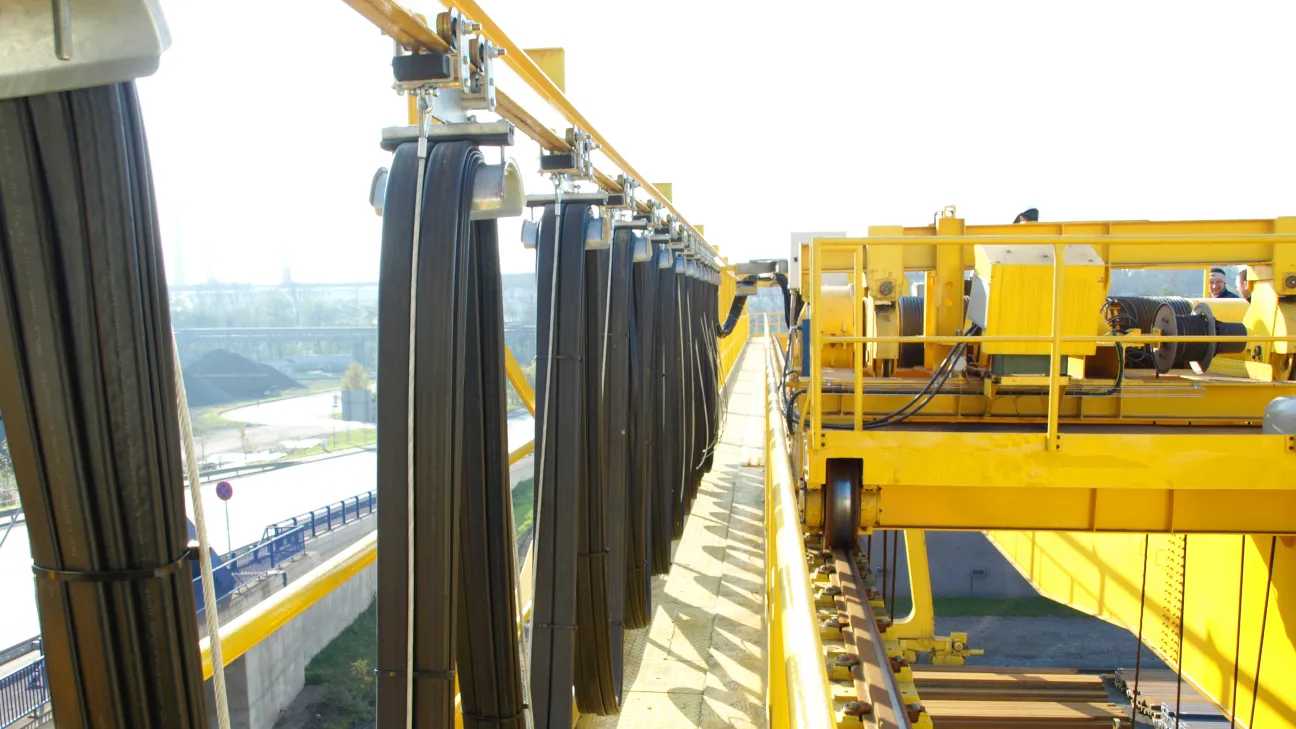 Process Crane with electromagnet at a loading facility in a steel mill